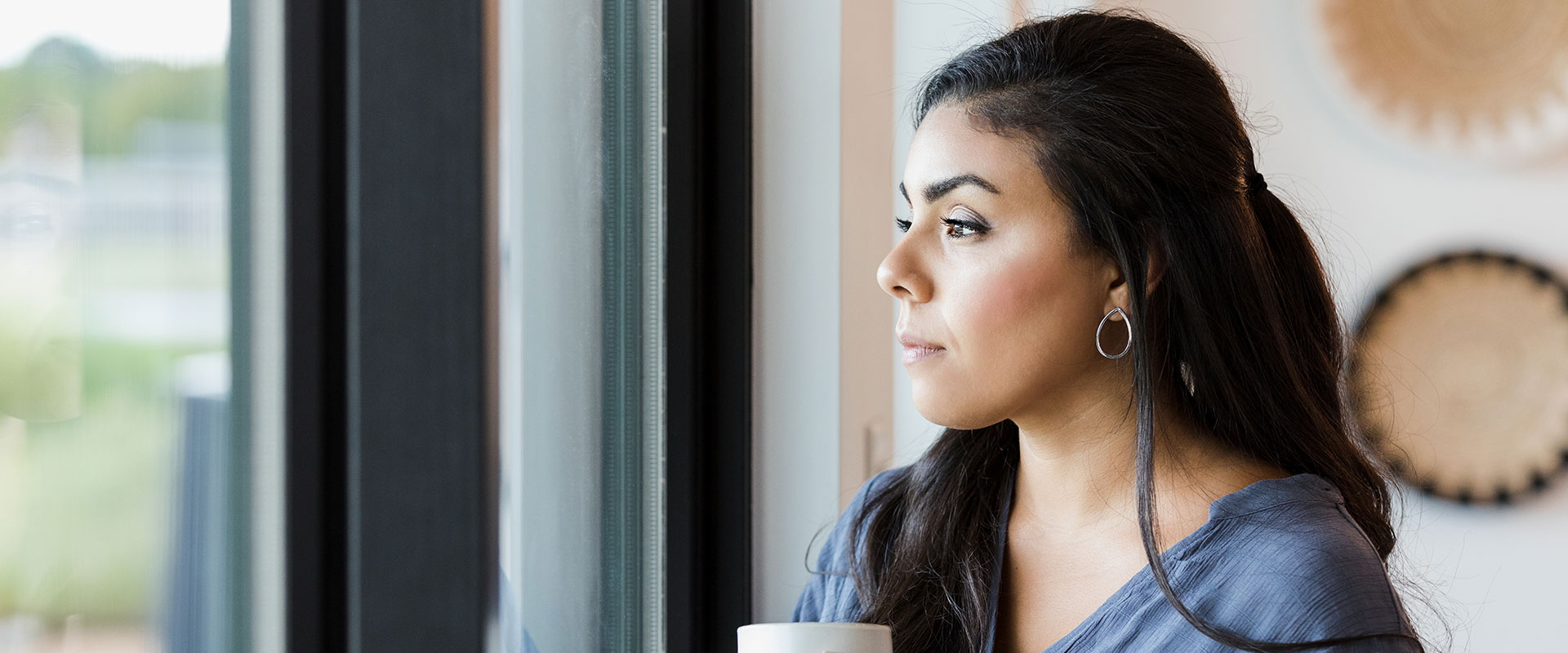 Woman looking out the window