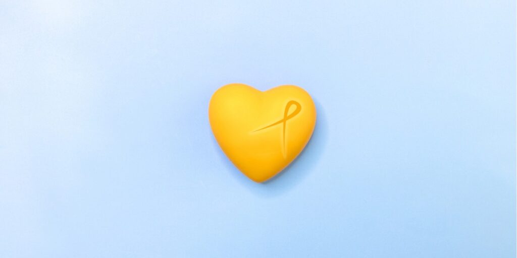 suicide prevention yellow heart and ribbon