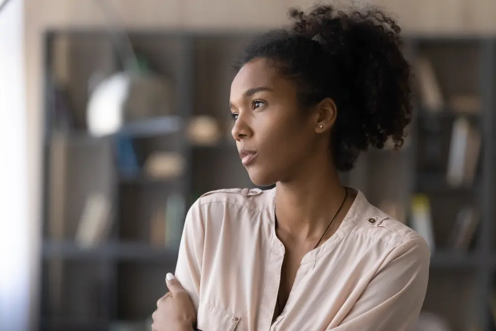 Woman staring into distance