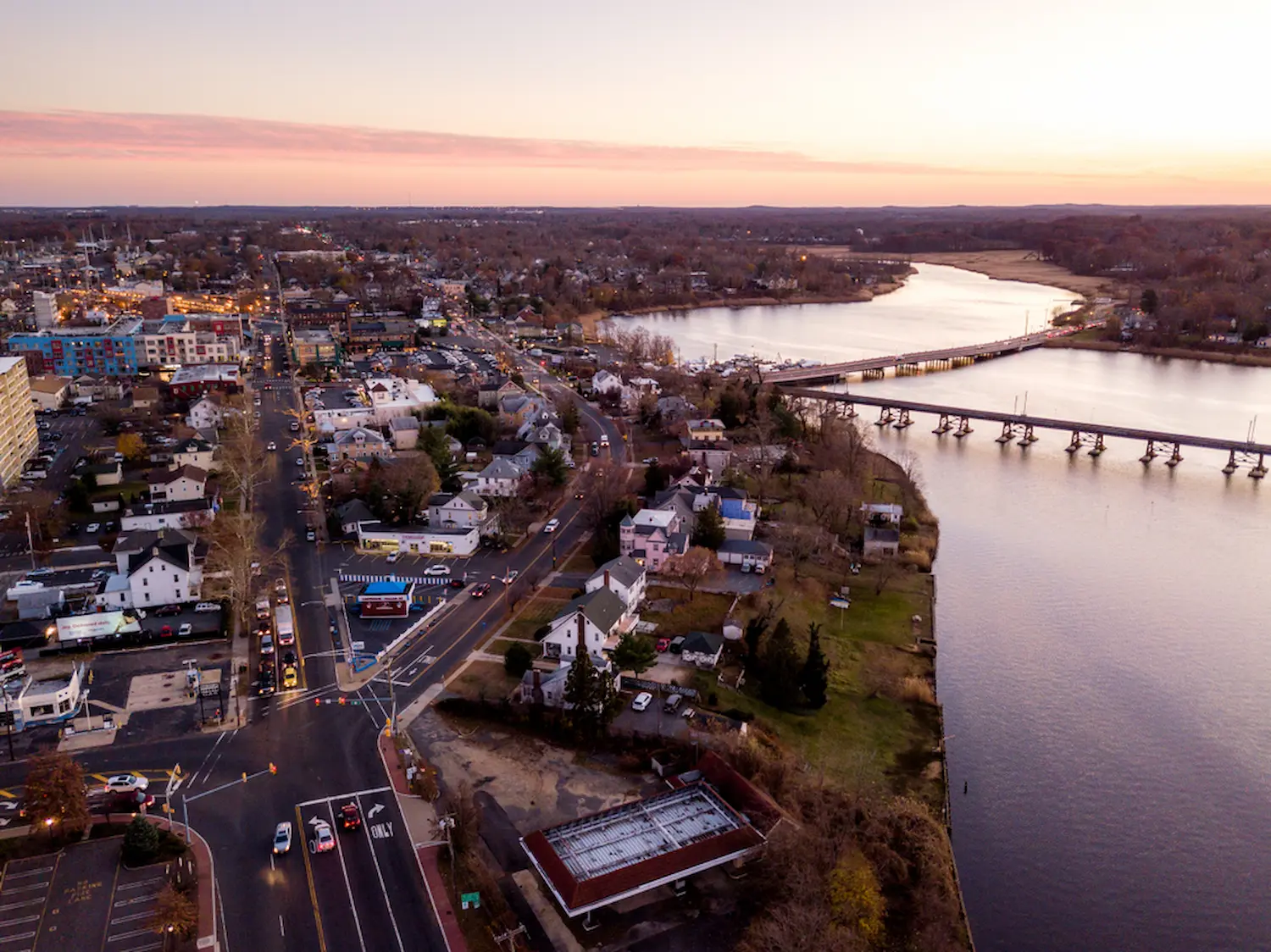 City by the river during sunset