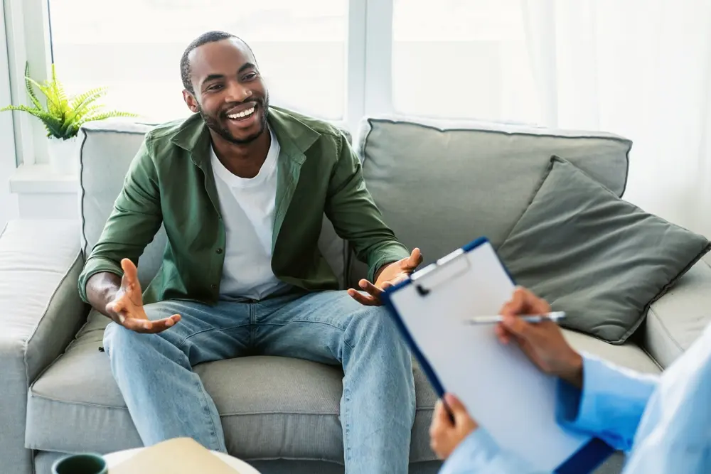 Young african american man happily doing therapy 