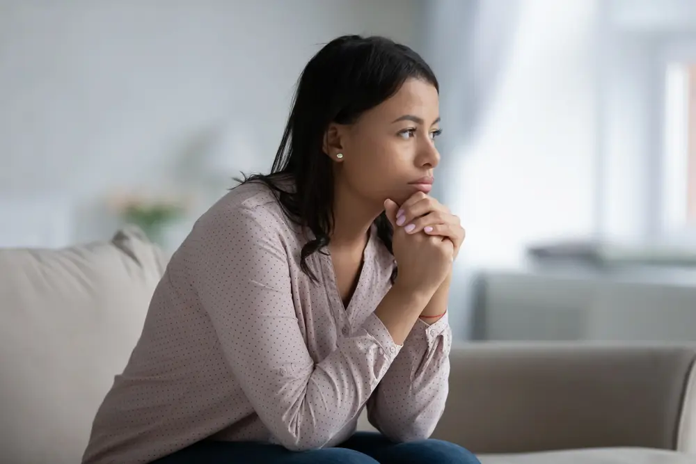 depressed young woman sitting